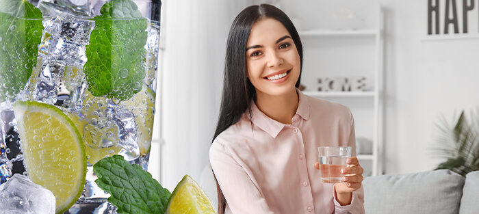 Frau mit gefiltertem Trinkwasser
